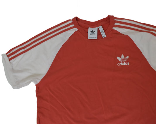 Appelsínugulur Adidas stuttermabolur.